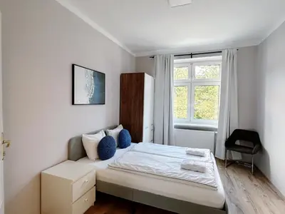 Ein Bett oder Betten in einem Zimmer der Unterkunft Up Resistances G