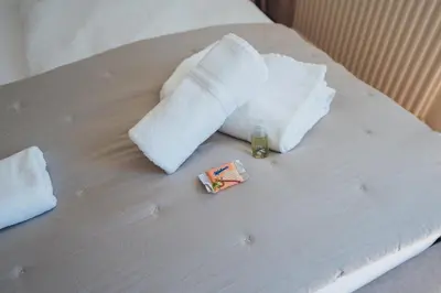 Ein Bett oder Betten in einem Zimmer der Unterkunft Bezauberndes Studio mit privatem Garten