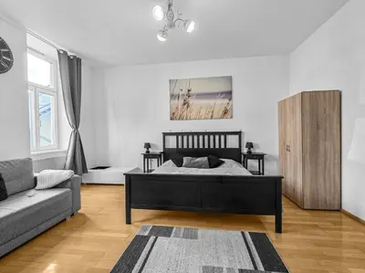 Ein Sitzbereich in der Unterkunft Three-Bedroom Delight, King-Size Beds