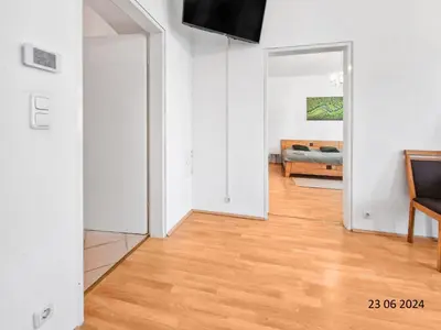Ein Bett oder Betten in einem Zimmer der Unterkunft Elegant Three-Bedroom Suite