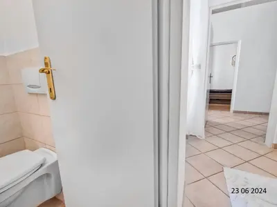Ein Badezimmer in der Unterkunft Elegant Three-Bedroom Suite