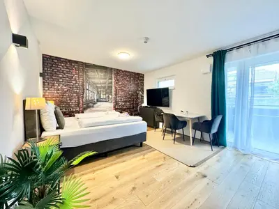 Ein Bett oder Betten in einem Zimmer der Unterkunft Wohnung mit Balkon und Parkplatz