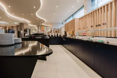 Ein Restaurant oder anderes Speiselokal in der Unterkunft Hampton By Hilton Vienna City West