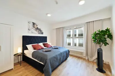 Ein Bett oder Betten in einem Zimmer der Unterkunft Stephansdom Residence Apartment