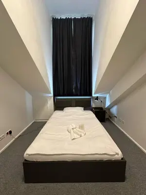 Ein Bett oder Betten in einem Zimmer der Unterkunft Franz Joseph Suite in center of Vienna