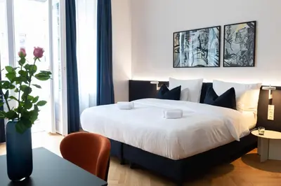 Ein Bett oder Betten in einem Zimmer der Unterkunft URBANAUTS STUDIOS Sylvette