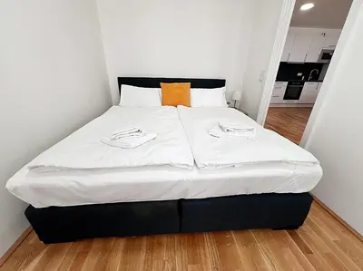 Ein Bett oder Betten in einem Zimmer der Unterkunft GG13 Apartments Vienna, Air-conditioned, next to metro, close to sights