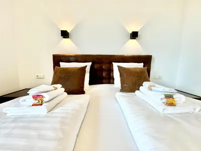 Ein Bett oder Betten in einem Zimmer der Unterkunft Designer Wohnung