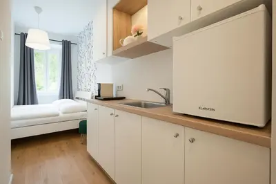 Küche/Küchenzeile in der Unterkunft DAINN Apartments Schönbrunn
