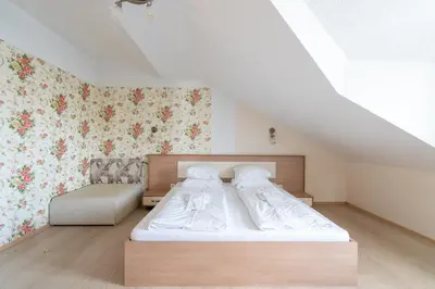 Ein Bett oder Betten in einem Zimmer der Unterkunft FarawayHomes Aparthotel Near Vienna Airport - Anytime Self Check-In