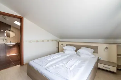Ein Bett oder Betten in einem Zimmer der Unterkunft FarawayHomes Aparthotel Near Vienna Airport - Anytime Self Check-In
