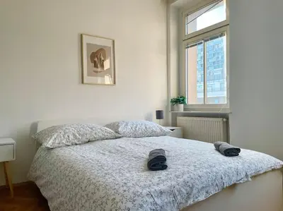 Ein Bett oder Betten in einem Zimmer der Unterkunft 110m2 Stylish 4 Bedroom Apartment