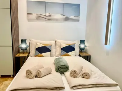 Ein Bett oder Betten in einem Zimmer der Unterkunft TheWICKI 10 - Wunderschöne Apartments in Wien