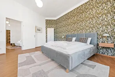 Ein Bett oder Betten in einem Zimmer der Unterkunft Schönbrunn City Apartment is calling - by 4ty3 Apartments