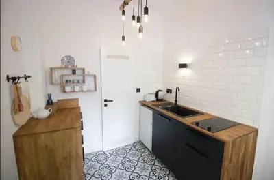 Küche/Küchenzeile in der Unterkunft Süßes Apartment nähe Volkstheater