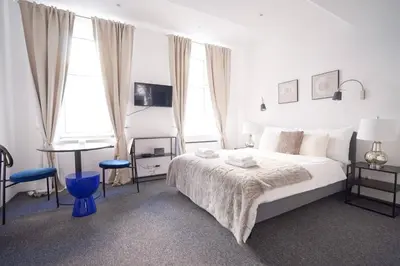 Ein Bett oder Betten in einem Zimmer der Unterkunft Next to Danube Canal, 5 min to city center with Metro