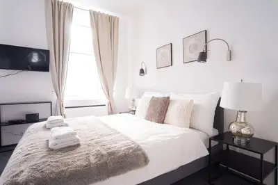 Ein Bett oder Betten in einem Zimmer der Unterkunft Next to Danube Canal, 5 min to city center with Metro