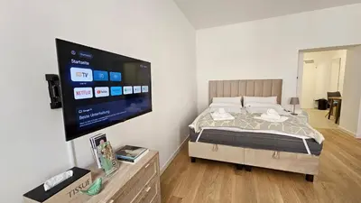 Ein Bett oder Betten in einem Zimmer der Unterkunft City Apartment nahe Schönbrunn 10