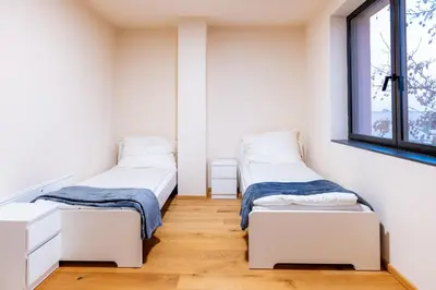 Ein Bett oder Betten in einem Zimmer der Unterkunft Villa Rose close to Vienna & Airport