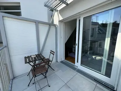 Ein Balkon oder eine Terrasse in der Unterkunft FeelHome-Dachterrasse-4 Gäste-WiFi