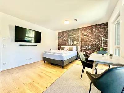 Ein Bett oder Betten in einem Zimmer der Unterkunft Chillige Wohnung mit Balkon