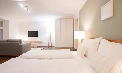Ein Bett oder Betten in einem Zimmer der Unterkunft Authentic Austrian Flat in the South of Vienna