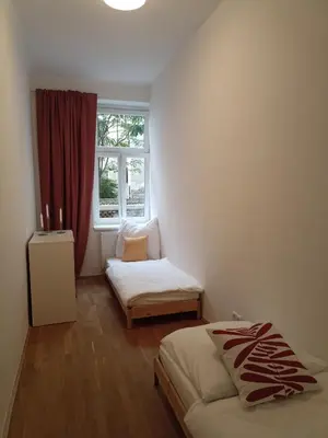 Ein Bett oder Betten in einem Zimmer der Unterkunft 170sqm with private garden