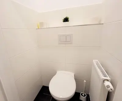 Ein Badezimmer in der Unterkunft Neulerchenfelder City Apartment