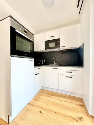 Küche/Küchenzeile in der Unterkunft Stylische Wohnung mit Balkon