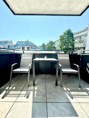 Ein Balkon oder eine Terrasse in der Unterkunft Stylische Wohnung mit Balkon
