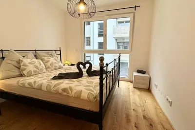 Ein Bett oder Betten in einem Zimmer der Unterkunft Wiener Townhouse Belvedere