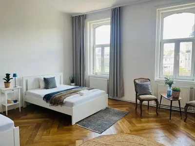 Ein Bett oder Betten in einem Zimmer der Unterkunft Modernes Design Apartment