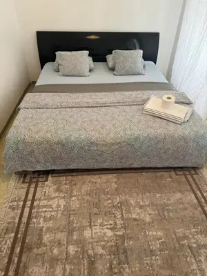 Ein Bett oder Betten in einem Zimmer der Unterkunft Ganzen Unterkunft 2 Zimmer