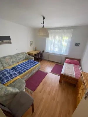 Ein Bett oder Betten in einem Zimmer der Unterkunft Gemütliches Altbauhaus