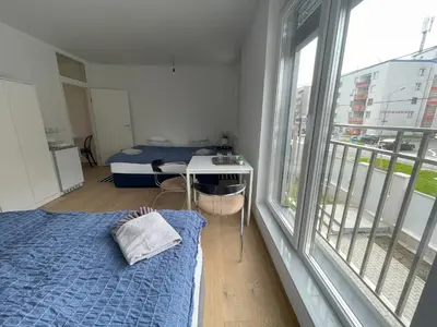 Ein Bett oder Betten in einem Zimmer der Unterkunft Green Garden Apartments