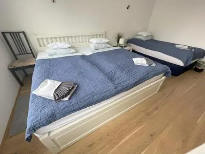 Ein Bett oder Betten in einem Zimmer der Unterkunft Green Garden Apartments