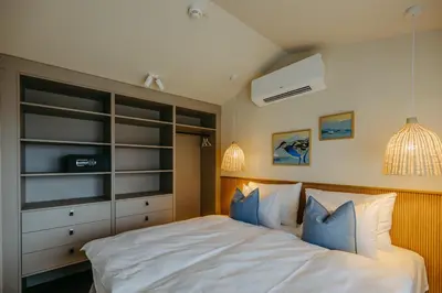 Ein Bett oder Betten in einem Zimmer der Unterkunft Neueröffnung NEUER STRAND inklusive Burgenland Card