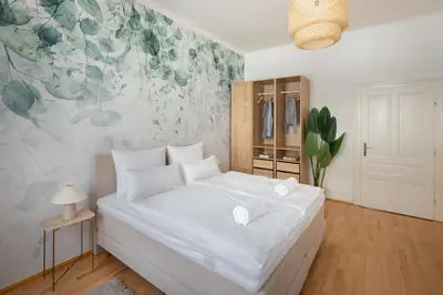 Ein Bett oder Betten in einem Zimmer der Unterkunft Oona Boutique Apartments