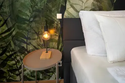 Ein Bett oder Betten in einem Zimmer der Unterkunft Oona Boutique Apartments