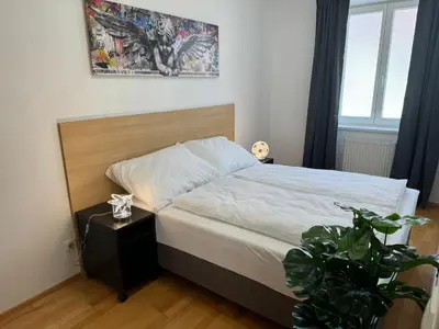 Ein Bett oder Betten in einem Zimmer der Unterkunft Apartment für 3 beim Westbahnhof