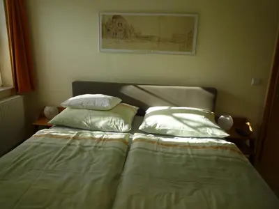 Ein Bett oder Betten in einem Zimmer der Unterkunft Gartenpension Prosl