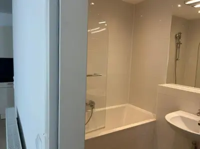 Ein Badezimmer in der Unterkunft Apartment Merkur