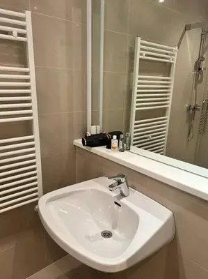 Ein Badezimmer in der Unterkunft Apartment Jupiter