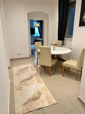 Ein Sitzbereich in der Unterkunft Apartment Jupiter