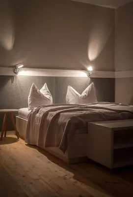 Ein Bett oder Betten in einem Zimmer der Unterkunft SCHEIBER Wein & Gästehaus