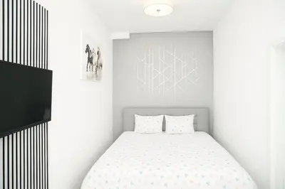 Ein Bett oder Betten in einem Zimmer der Unterkunft City Flat C