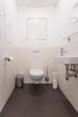 Ein Badezimmer in der Unterkunft Spacious Group Apartment with Balcony