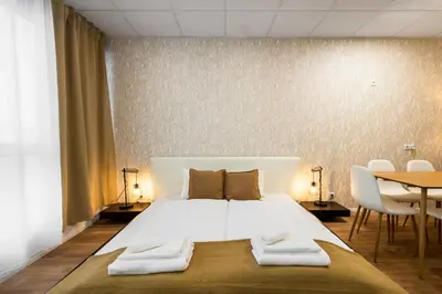 Ein Bett oder Betten in einem Zimmer der Unterkunft Livin Apartments - T75a