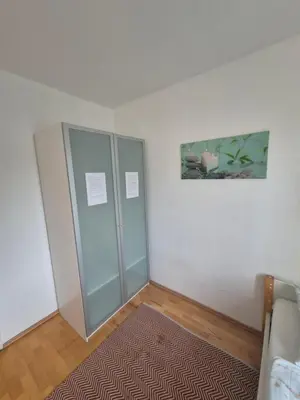 Ein Bett oder Betten in einem Zimmer der Unterkunft Vienna Room Nr 12