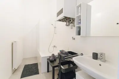 Küche/Küchenzeile in der Unterkunft Cozy City Center Apartment